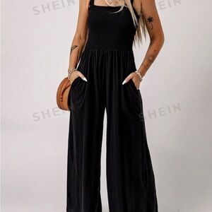 Black smocked jumpsuit